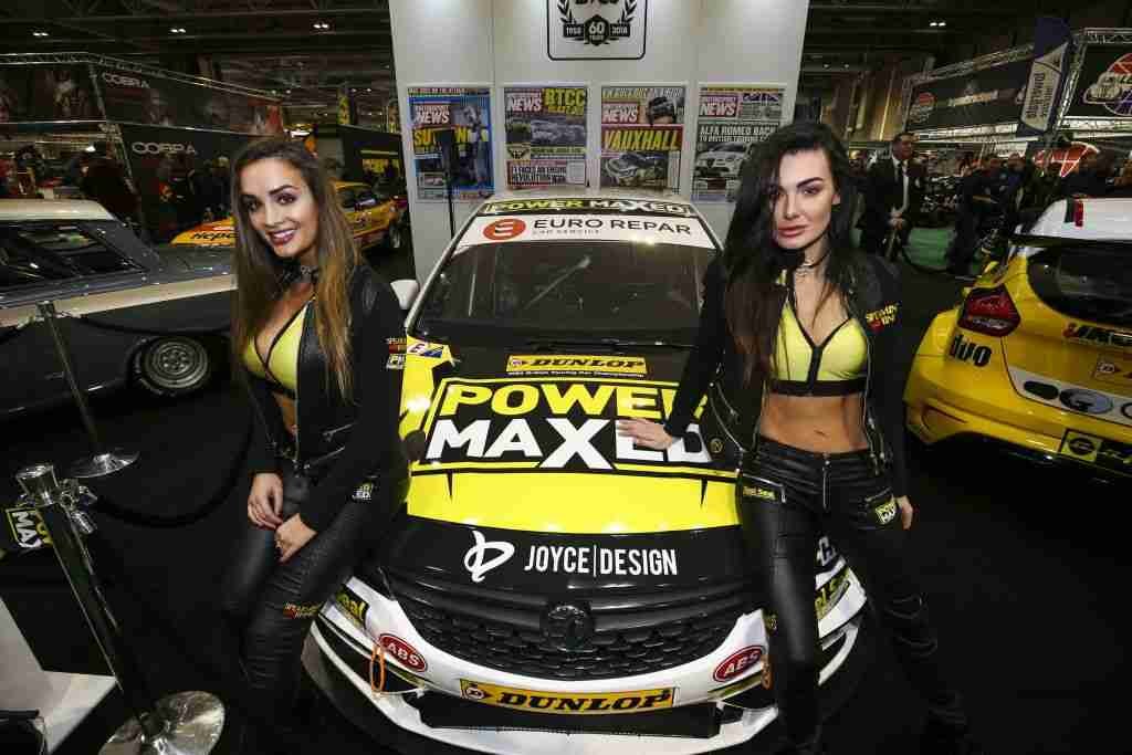 Promotional girls on the BTCC stand at Autosport International, Day