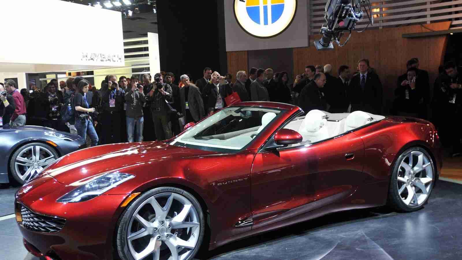 Luxury auto designer Henrik Fisker says he’ll unveil a new